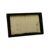 Top face of filter at lower angle, full rubber perimeter frame visible including scalloped bottom edge detail, media showing age yellowing at corners.