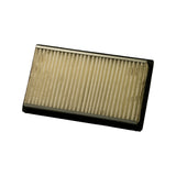 Underside of filter showing reverse face of pleated paper media, cream/yellowish with age, metal retaining mesh visible at top edge, rubber frame base.