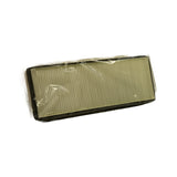 Three-quarter elevated view showing top face and short-end profile of filter in poly wrap — overall rectangular panel form confirmed, plastic wrap sealed around part
