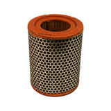 Filter standing upright, top end cap view. Orange rubber seal ring clearly visible, perforated steel outer casing with paper element visible through apertures.