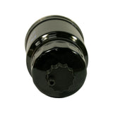Top-down view of black ribbed plastic priming cap. Small bleed nipple offset from centre. Stepped shoulder of black body visible around cap perimeter. Clean unused condition.