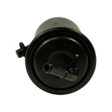 End-on view of outlet face showing single straight barb fitting offset from centre, secondary small port visible, light surface dust on black painted cap