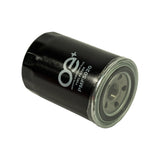 Filter at low angle showing canister body with PMF5020 legend and OE+ branding, base plate with chrome sealing flange and six return ports visible