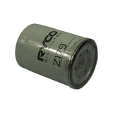 Three-quarter diagonal view of canister showing base end; light grey-green paint finish with no chips; base plate and gasket assembly clearly visible; plastic protective film intact over base.