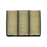 Reverse (outlet) face viewed from above; pleat valleys show a slightly open, fibre-mat-finished surface. Black fabric seal strip visible around perimeter. Some minor fibres at lower edge consistent with NOS shelf storage.