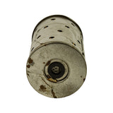 Top-down view of filter showing flat top end cap with 'FRAM' embossed lettering and central inlet port with black rubber grommet seal; light brown corrosion spotting around port.