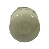 Top of filter canister (closed dome end) showing yellow/gold inkjet batch code stamped: 'OS ISO/TS16949' and date '2010/10/19'.