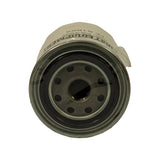 Base plate (inlet face) of filter showing standard spin-on construction: central threaded boss surrounded by nine inlet holes arranged in a circle on a flat steel plate. Thread appears to be 3/4-16 UNF. Base plate shows minor surface oxidation consistent with age.