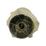 Top of filter element through plastic wrap. Smooth domed metal end cap with no port, showing aged patina consistent with long-term shelf storage.