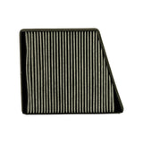 Filter angled front-face view, showing full pleated charcoal media surface and foam-edged black frame with tapered depth profile visible at right edge — one side of frame is notably shallower than the other.