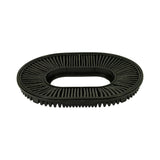 Three-quarter angled view showing full oval profile of filter from below; serrated rubber gasket edge around outer perimeter clearly visible; pleated paper media on top face.
