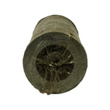 Top-end view looking down into open bore of the filter element. Plastic wrap gathered and tied at top. Faint stamp visible reading 'ULX 51442' plus additional text partially legible. Open-centre element construction confirmed.