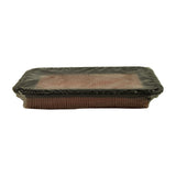 Long-edge profile view showing filter depth/height; pleated element visible through clear wrap; black rubber frame evident top and bottom; no markings visible on edges