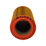 Top-down view into the open end of the filter showing the inner steel mesh support tube and orange end-cap sealing ring. Part number 'C 15 104' and MANN brand name moulded into the orange end-cap rim. Additional text (batch/date code) partially legible around the rim.