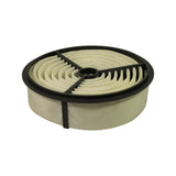Angled top-front view of intake face showing black rubber outer ring, radial paper pleats, and three-spoke plastic grid. Filter condition consistent with NOS — media is clean and white with no discolouration or contamination.