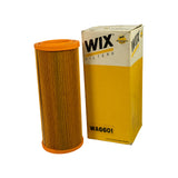 Filter element standing beside its yellow and white WIX Filters branded retail box, WA6601 part number printed on box face, '#1 FILTER IN NASCAR' badge visible