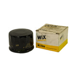 Filter standing next to its white and yellow WIX Filters box, box front clearly labelled OIL FILTER WL7254 with From the Affinia Family of Brands tagline.