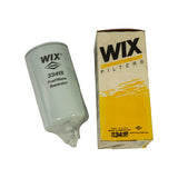 Filter laid alongside its original yellow and white Wix Filters retail box; box face reads 'WIX FILTERS' with 'FUEL FILTER / FILTRO de COMBUSTIBLE 33418' and the Dana diamond mark