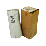 Filter stood alongside its original WIX-branded brown cardboard box, box shows shelf wear and partial label with 33216 part number and barcode strip across the top