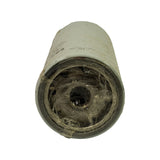 Top-down view into the open end of the filter showing the threaded mounting boss, sealing gasket recess, and inlet/outlet ports, with crinkled protective shrink wrap visible inside