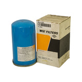 Filter standing beside original WIX FILTERS / DANA box; box front shows '51383 OIL FILTER' and *PH5130 cross-reference on inset label, FIL-00982 barcode sticker visible on top of box