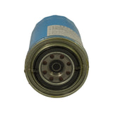 Bottom (gasket) end of filter showing eight inlet holes around central threaded port, rubber sealing gasket in place, light yellowing of bare metal base