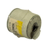 Angled view showing both the open top end with central hole and the label face on the side