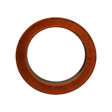 Top-down view showing the full ring footprint, pleated outer wall hidden under the orange end seal, wire mesh inner liner just visible at the bottom of the open centre