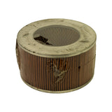 Top-down angled view showing top metal end cap with light surface scratching and the pleated paper media around the central air inlet; clear shrink-wrap film torn in places exposing pleats