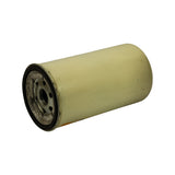 Filter laid on its side, threaded base end facing the camera, showing the central female thread, surrounding inlet holes and black sealing gasket; minor light corrosion visible on the steel base plate.