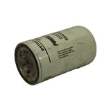Three-quarter view showing the perforated inlet ring at the base through the clear wrap, the address block on the side of the can, and 'POWER G[UARD]' / '23530[707]' / 'SECON[DARY]' wrapping markings