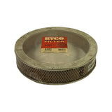 Three-quarter angled view showing the shallow pancake profile of the filter with diamond-mesh outer screen around the paper element and metal end caps top and bottom, still factory-sealed in shrink wrap