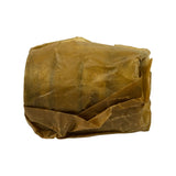 Reverse angle of wrapped bearing set showing second end. Wrapper folded and crumpled but largely intact on this face.
