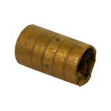 Angled side view of the wrapped bearing set showing circular oil holes and split-lines of the individual cam bearing shells visible through the VCI paper wrap.