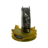 Edge-on profile of bearing stack showing full bearing width. Yellow plastic tray visible at bottom. Bearing shells still in their plastic protective wrap, showing consistent wall thickness and steel-backed construction.