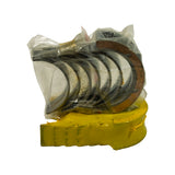 Part contents visible — bearing shells laid out or partially extracted from packaging