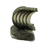 Opposite fan view of 5 upper shells showing smooth inner bore surface with oil groove. Steel-backed outer face visible. Original plastic wrap partially retained.