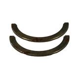 Top-down flat view of both steel-backed washers side by side. Machined inner bearing surface partially visible; tips show light corrosion typical of long-term NOS storage.