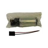 Pump and wiring harness removed from box, laid flat. Cylindrical steel pump body with black plastic strainer end at left and flat disc end cap at right. Black 2-pin rectangular connector on red/black lead.