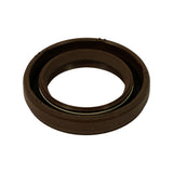 Three-quarter angled view of the seal from the spring side, clearly showing the coiled garter/clamping spring seated in the primary lip groove. Rubber is uniform dark brown with no cracking or shelf degradation.