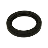 Three-quarter angled view from the front/outer face showing flat rubber outer surface, moulded tabs, and the inner bore with integrated dust lip; overall good condition with no cracks or distortion