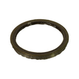 Angled profile shot of seal showing thickness, outer metal casing with crimped/knurled outer edge for press-fit retention, and rubber sealing lip detail