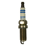 Full-length straight-on view of spark plug showing white ceramic insulator with blue BOSCH text, single blue stripe, hex body, threaded steel shell, and single bent ground electrode with small platinum-tipped center pin.