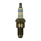 Straight-on front view of spark plug standing upright, showing white ceramic insulator with BOSCH and R6 markings, blue stripe rings, nickel hex shell, and threaded steel body with triple ground electrode at tip. Stamp on shell reads 7LTC+ GERMAN.