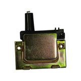 Front-on view of coil showing full mounting bracket width, black plastic coil body with HT tower, and two-pin connector; bracket exhibits green-tinted zinc-chromate finish with light shelf marks.