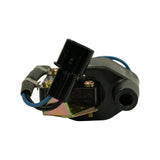 End-on view showing HT tower outlet and connector pigtail from above, revealing the laminated core and igniter module underside.