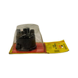 Side/angled view of blister pack partially opened. Black phenolic distributor cap inside clear plastic dome secured to red backing card. Four HT tower terminals visible on top of cap. Snap-lock tabs visible on lower rim of cap. Bosch and GA192 text legible on card reverse.