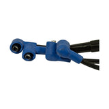 Close-up of the blue dual-outlet distributor connector block with two 90-degree boots, showing internal silver spring contacts; partial text on cable jacket reads 'QUALITY … SPIRAL WIRE'.