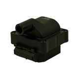 Angled rear-top view of coil showing HV boot from opposite side and base connector clips. Inverted stamping of XIC8100 and M0415 visible on body.