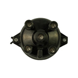 Top-down view into cap interior showing five brass terminal contacts — four outer HT positions and one central carbon brush contact. Two mounting lugs and one latch tab visible on base rim.